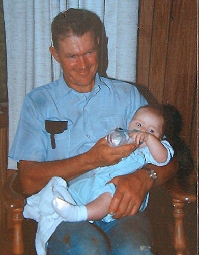 Dad holding baby Jessica