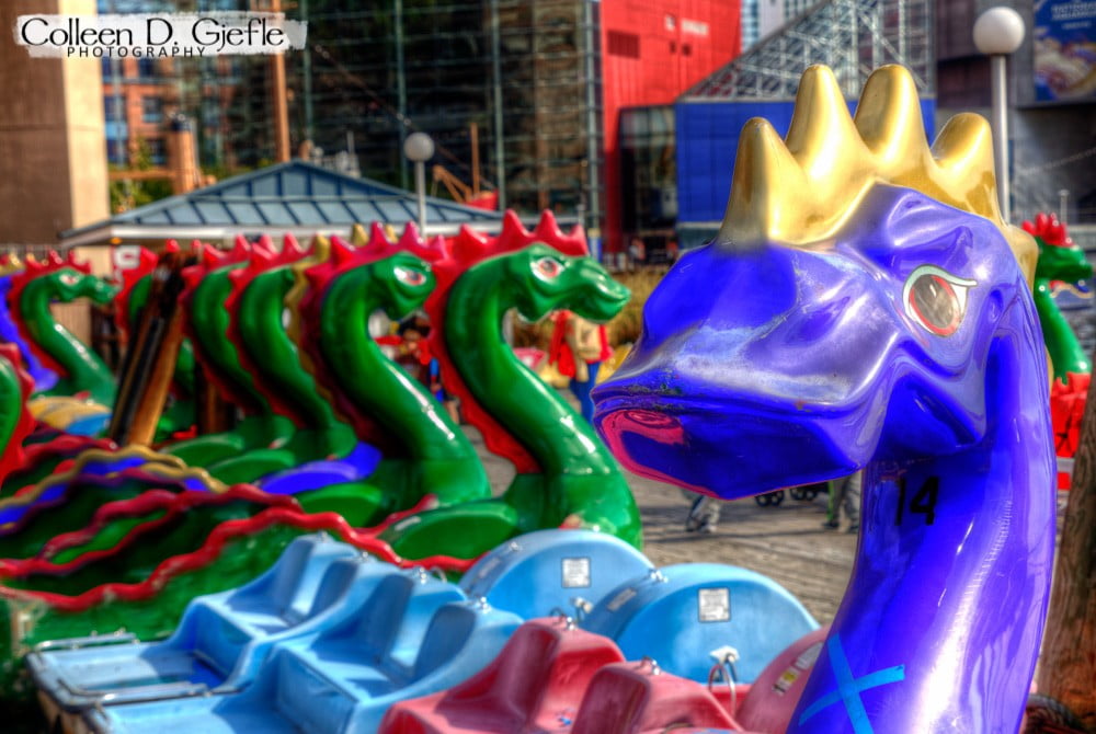 Colorful dragon floats with big blue one in front