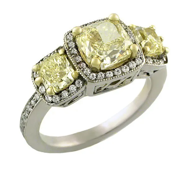 Ring featuring yellow and white diamonds